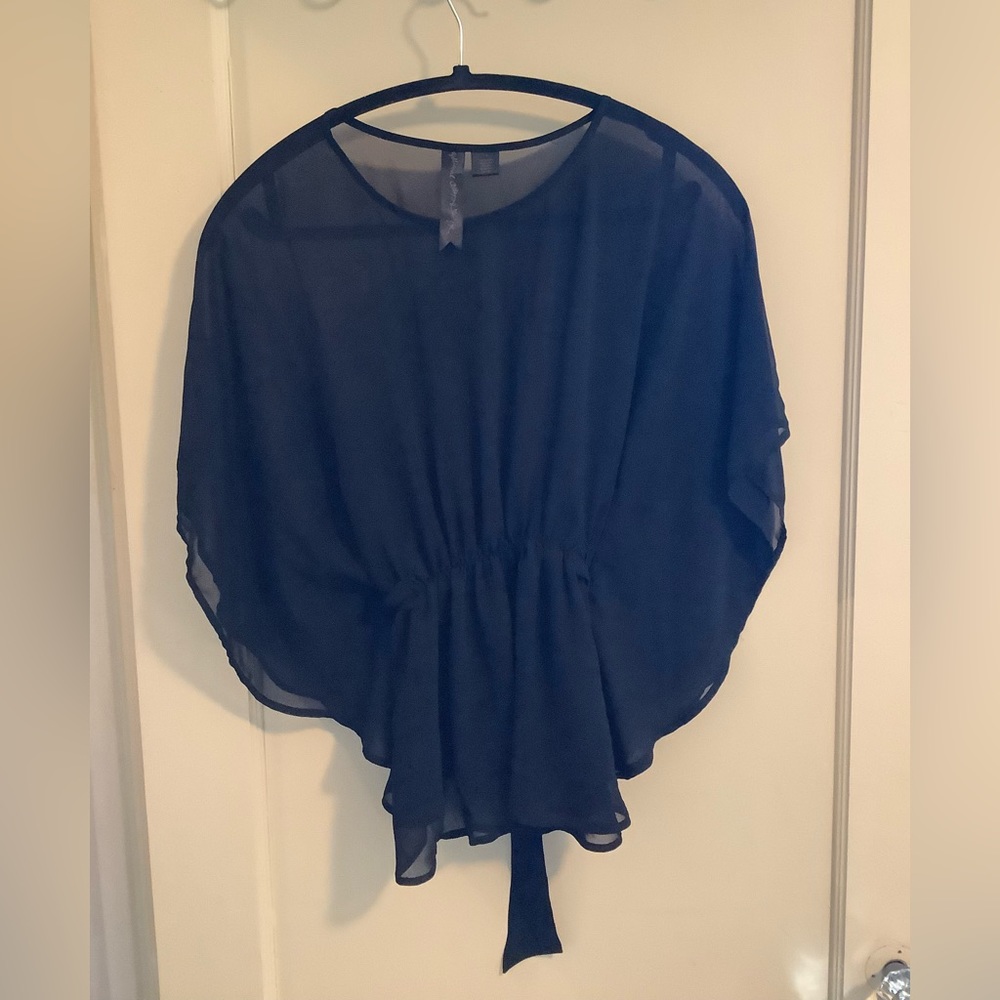 Flowy, sheer, black “going-out” top